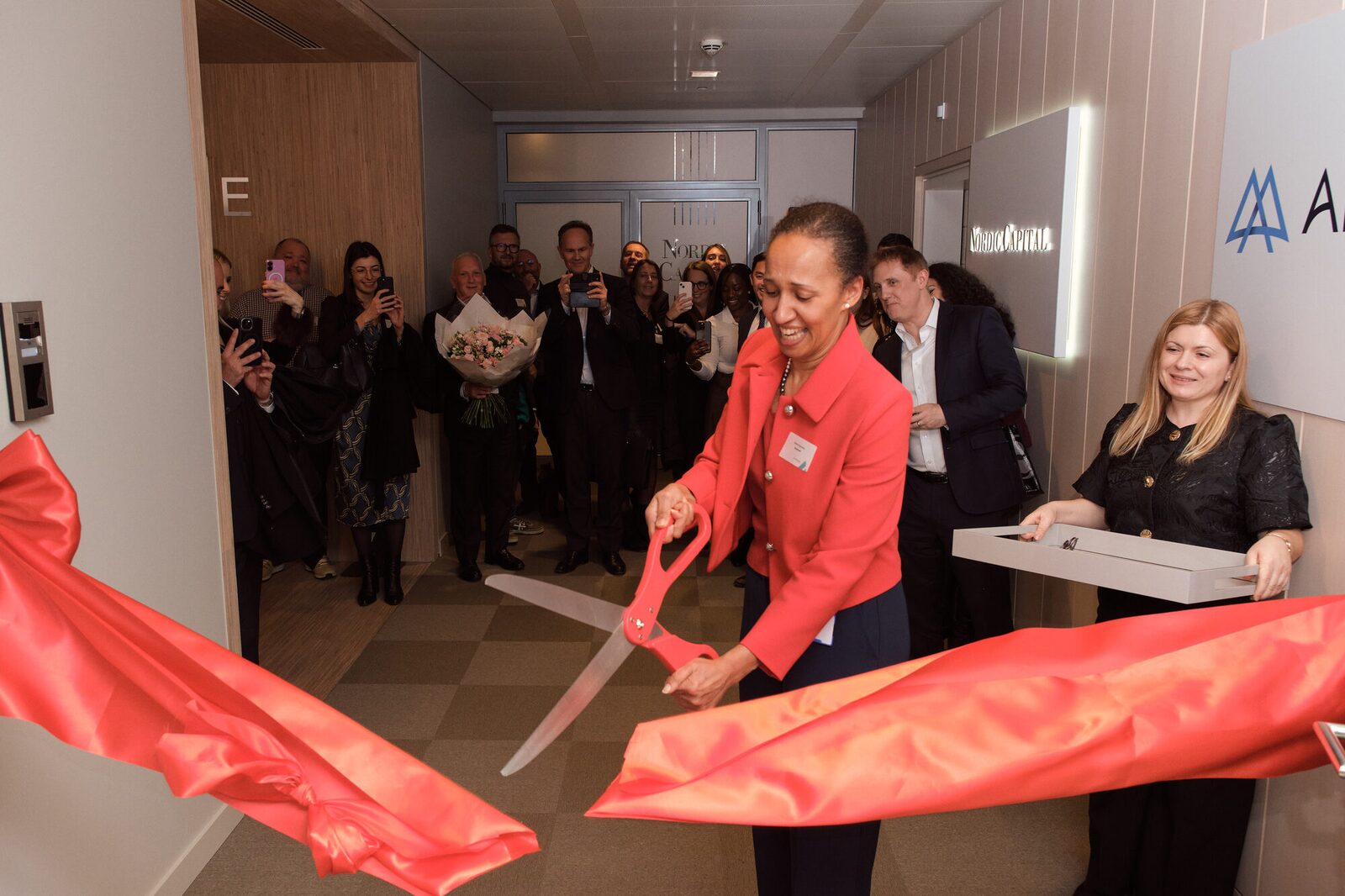 Arcmont — Ribbon cutting at the new office opening