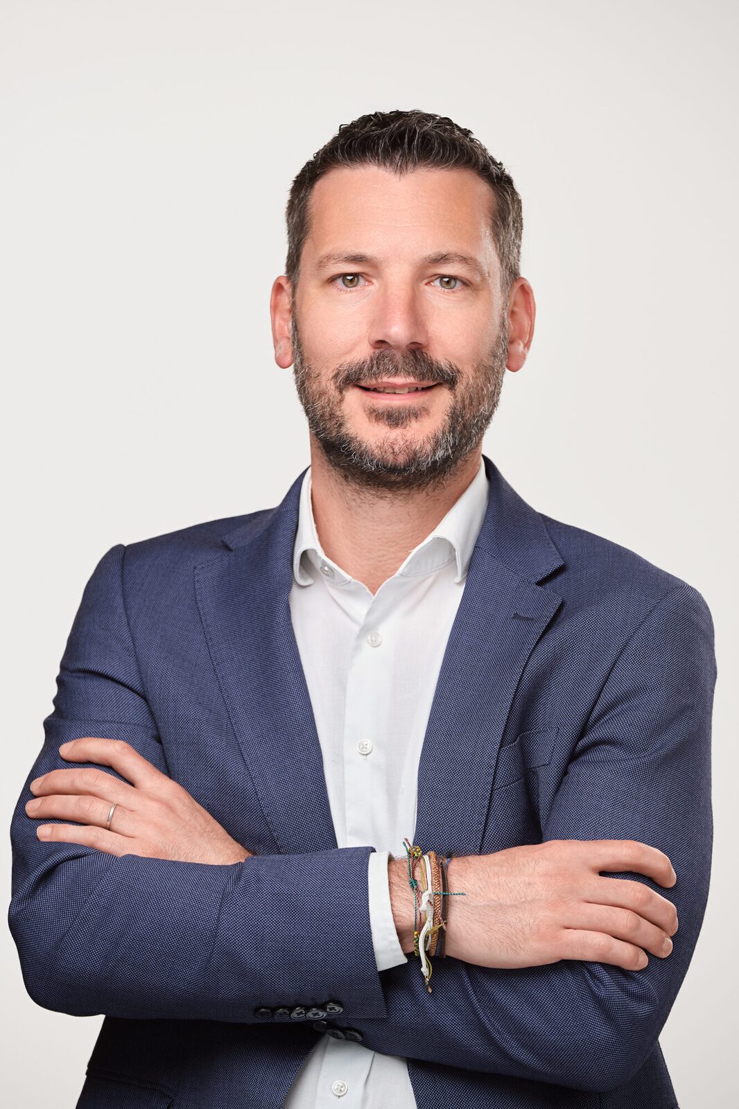 Hawksford — Three-quarter business portrait, arms crossed