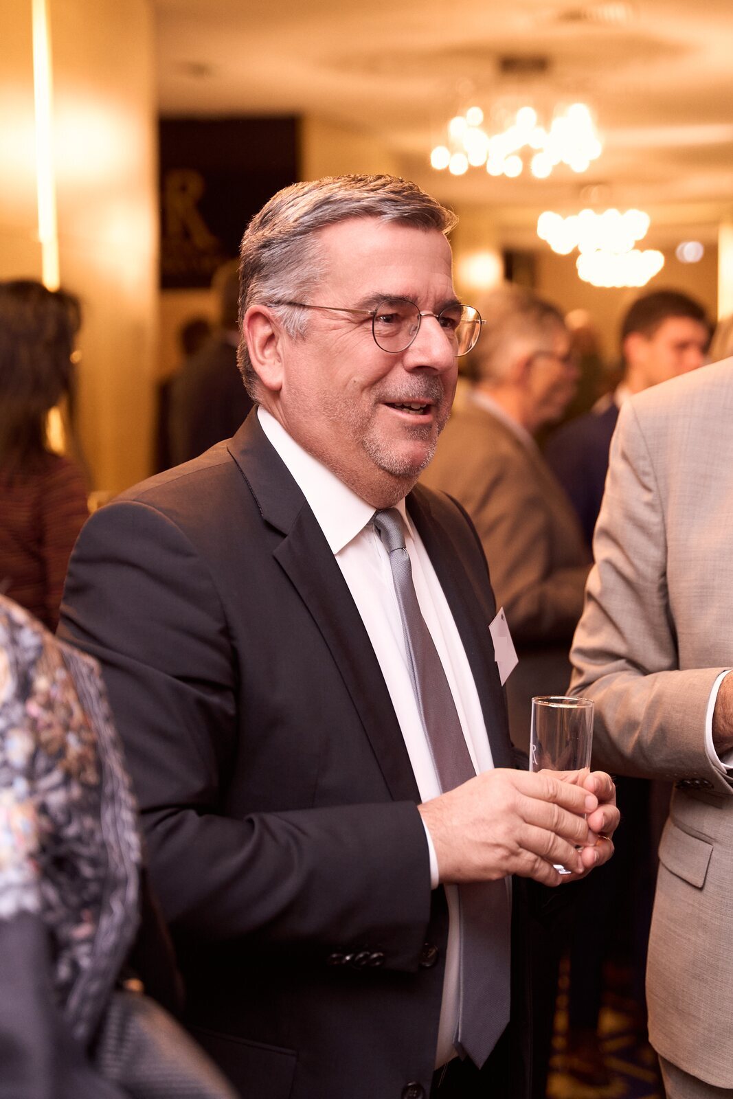 University of Luxembourg — Guest with a glass during the reception